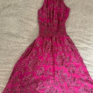 High neck dress with floral detail. Cinched waist makes it super flattering.